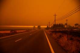 Haze is seen off of Skyway Highway after the Camp Fire tore through the town of Paradise, California, on Friday, Nov. 9, 2018.