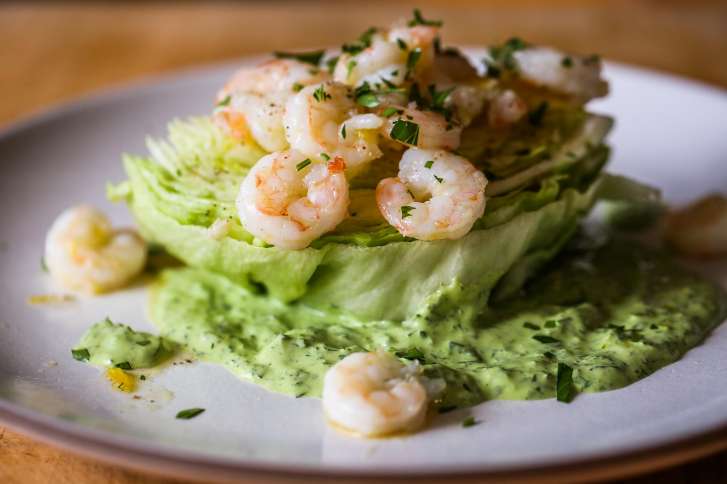 The baby iceberg wedge salad with chilled shrimp, mint and green goddess dressing is seen in the Chronicle test kitchen in San Francisco, California, on Tuesday, July 3, 2018.