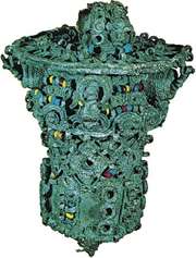Leaded bronze ceremonial object, thought to have been the head of a staff, decorated with coloured beads of glass and stone, 9th century, from Igbo Ukwu, Nigeria; in the Nigerian Museum, Lagos.