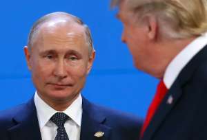 Russia's President Vladimir Putin and U.S. President Donald Trump are seen during the G20 summit in Buenos Aires, Argentina November 30, 2018. REUTERS/Marcos Brindicci
