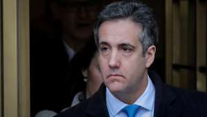 a man wearing a suit and tie looking at the camera: Michael Cohen’s upcoming testimony: What can he talk about?