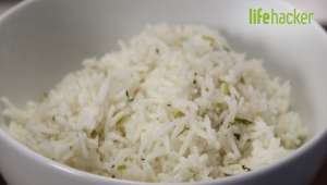 a white bowl filled with broccoli and rice