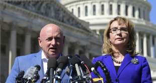 FILE- In this Oct. 2, 2017, file photo former Rep. Gabrielle Giffords, D-Ariz., ...