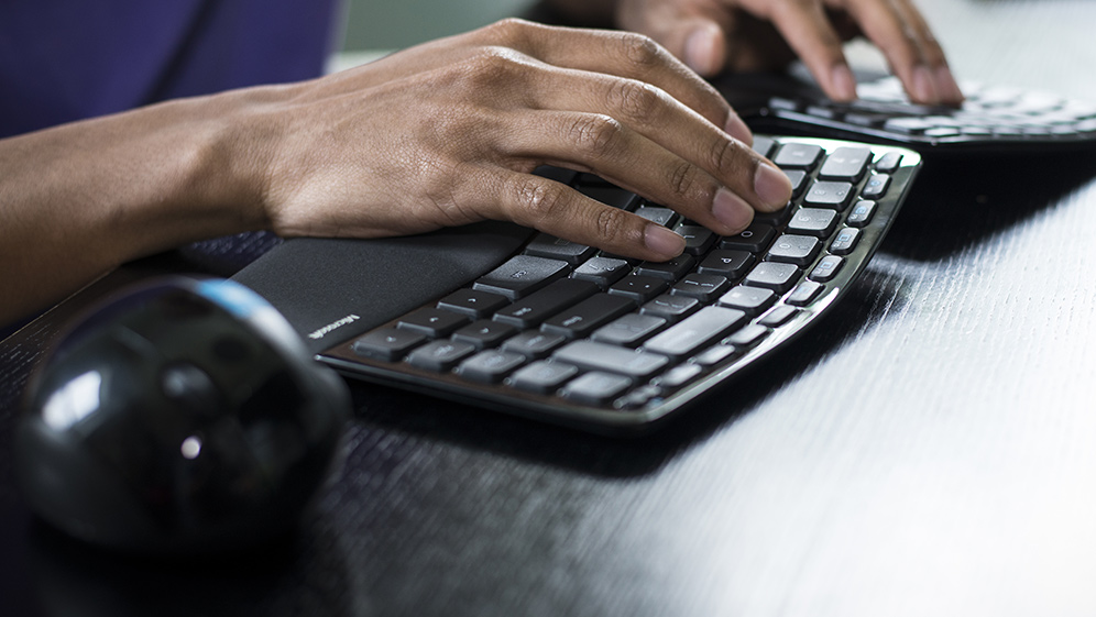 Microsoft Ergonomic Comfort Keyboard and Mouse in Use