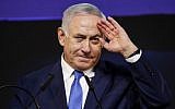 Prime Minister Benjamin Netanyahu gestures as he addresses Likud supporters at his party's headquarters in Tel Aviv on election night early on April 10, 2019. (Thomas COEX / AFP)