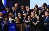 Prime Minister Benjamin Netanyahu with Likud Party candidates and MKs attend an event as the results of the Israeli general elections are announced, at the party headquarters in Tel Aviv, on April 10, 2019. (Gili Yaari/FLASH90)