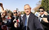 Blue and White leader Benny Gantz arrives at a polling station to vote in his hometown of Rosh Ha'ayin on April 9, 2019. (Sraya Diamant/Blue and White)