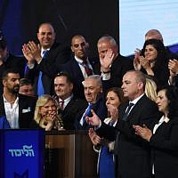 Prime Minister Benjamin Netanyahu with Likud Party candidates and MKs attend an event as the results of the Israeli general elections are announced, at the party headquarters in Tel Aviv, on April 10, 2019. (Gili Yaari/FLASH90)