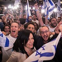 Supporters of the Blue and White party react to the first voting results in the general elections, at the party headquarters in Tel Aviv, on April 09, 2019 (Hadas Parush/Flash90)