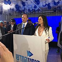 New Right co-leaders Ayelet Shaked (R) and Naftali Bennett address supporters at their campaign headquarters in Bnei Brak on April 9, 2019. (Jacob Magid/Times of Israel)