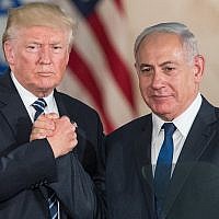 US President Donald Trump, left, and Prime Minister Benjamin Netanyahu shake hands at the Israel Museum in Jerusalem on May 23, 2017. (Yonatan Sindel/Flash90)
