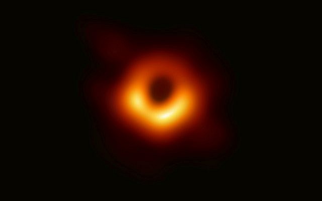 Scientists revealed the first image ever made of a black hole after assembling data gathered by a network of radio telescopes around the world. The image was released April 10, 2019, by Event Horizon Telescope.  (Event Horizon Telescope Collaboration/Maunakea Observatories via AP)