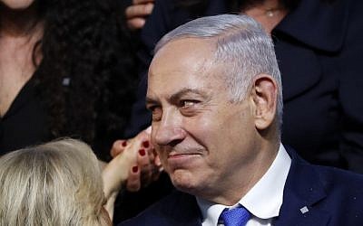 Prime Minister Benjamin Netanyahu reacts after addressing supporters at his Likud party election headquarters in the coastal city of Tel Aviv on election night early on April 10, 2019. (Thomas Coex/AFP)