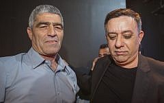 Labor party chairman Avi Gabbay (right) with party member Tal Russo as the results in the Israeli general elections are announced, at the party headquarters in Tel Aviv, on April 09, 2019. (Flash90)