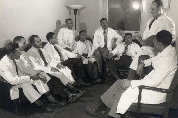 Charles Drew sitting with medical residents at Freedmen's Hospital