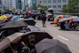 Protesters rest on the road on July 2 in Hong Kong, China.