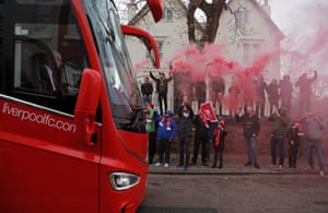 Fans welcome the Liverpool team coach before the Liverpool v Huddersfield Premier League match at Anfield in April 2019.