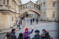 OXFORD, UNITED KINGDOM - JANUARY 19: A tour group are shown Hertford Bridge, a skyway joining two parts of Hertford College at University of Oxford on January 19, 2018 in Oxford, England. Students at Oxford University belong to colleges, a small interdisciplinary academic community with facilities including a dining room, bar and common rooms. ROB STOTHARD FOR USN&WR