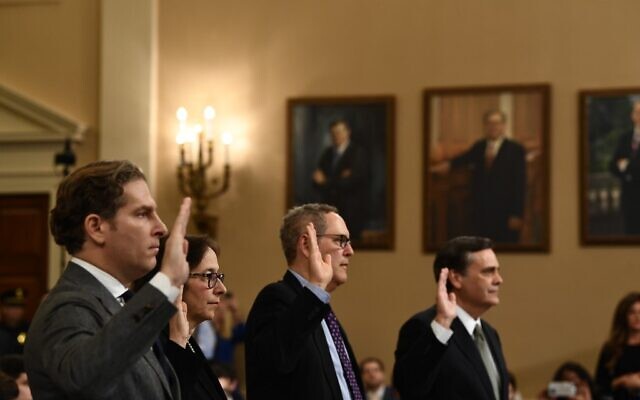 Left to right: Prof. Noah Feldman, Prof. Pamela S. Karlan, Prof. Michael Gerhardt and Prof. Jonathan Turley take the oath during a House Judiciary Committee hearing on the impeachment of US President Donald Trump on Capitol Hill in Washington, DC, December 4, 2019. (Brendan Smialowski/AFP)