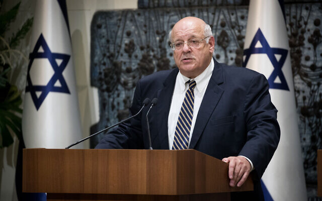 Supreme Court Justice Hanan Melcer, the chairman of the Central Elections Committee, presents the official results of the elections for the 22nd Knesset to President Reuven Rivlin (unseen), at the President's Residence in Jerusalem, September 25, 2019. (Yonatan Sindel/Flash90)