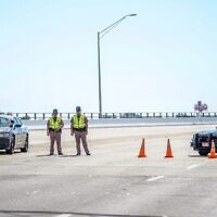 Florida state troopers block traffic over the Bayou Grande Bridge leading to the Pensacola Naval Air Station following a shooting on December 6, 2019, in Pensacola, Florida. (Josh Brasted/Getty Images/AFP(