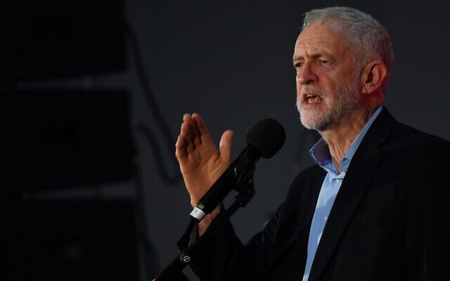 Britain's opposition Labour party leader Jeremy Corbyn speaks on stage at a rally as he campaigns for the general election in Swansea, south Wales on December 7, 2019 (DANIEL LEAL-OLIVAS / AFP)