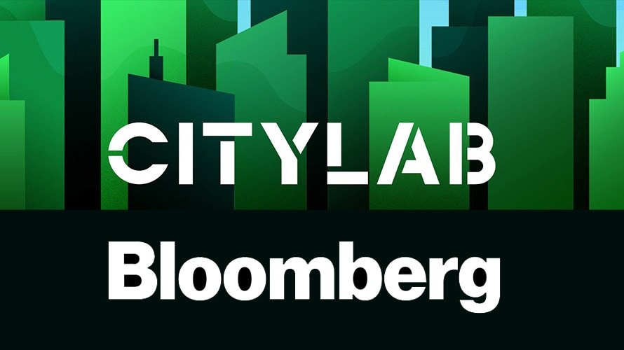 citylab bloomberg logos on a dark green and black background with skyscrapers