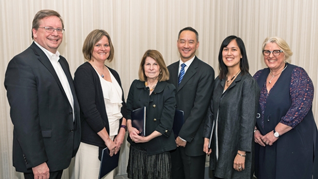 This is a photo of the awardees standing with Dean of Faculty Jon Western and Acting President Sonya Stephens.