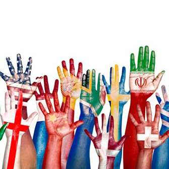 Raised hands painted with world flags.