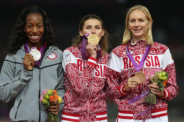 (L-R) Silver medalist Brigetta Barrett of the United States, gold medalist Anna Chicherova of Russia and bronze medalist Svetlana Shkolina of Russia pose on the podium during the medal ceremony for the Women's High Jump  of the London 2012 Olympic Games on August 11, 2012  (Getty Images)