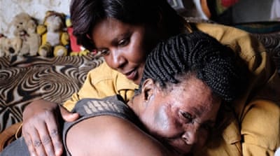 Susan Kigula meets her friend and ex-prisoner, Justine [Al Jazeera]