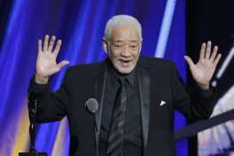 FILE - This April 18, 2015 file photo shows singer-songwriter Bill Withers speaking at the Rock and Roll Hall of Fame Induction Ceremony in Cleveland. Withers, who wrote and sang a string of soulful songs in the 1970s that have stood the test of time, including "Lean On Me," "Lovely Day" and "Ain't No Sunshine," died in Los Angeles from heart complications on Monday, March 30, 2020. He was 81. (AP Photo/Mark Duncan, File)