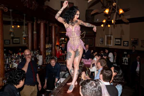 Burlesque dancer, Frankie Fictitious, performs at Comstock Saloon on March 4, 2020.