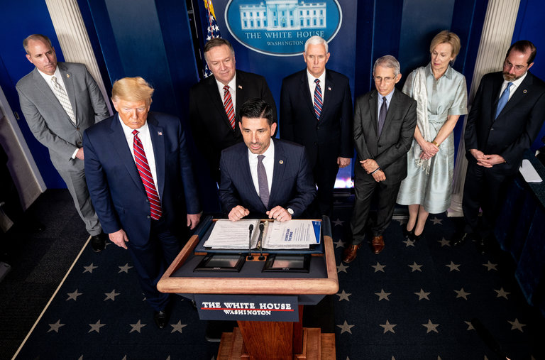 Chad Wolf, center, the acting secretary of Homeland Security, with President Trump and members of the coronavirus task force in March. The department is preparing to issue a warning about Chinese cyberattacks.