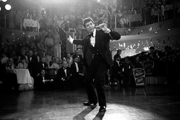 FILE - In this Dec. 31, 1968 file photo, Tom Jones performs at the "Bal Pare" in Munich, Germany. Jones, the Welsh star whose snake hips and stage presence earned comparisons to Elvis Presley, turns 80 on Sunday, June 7.