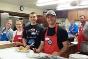 Family members and volunteers offer up as many as 800 pancakes an hour at the annual benefit breakfast.