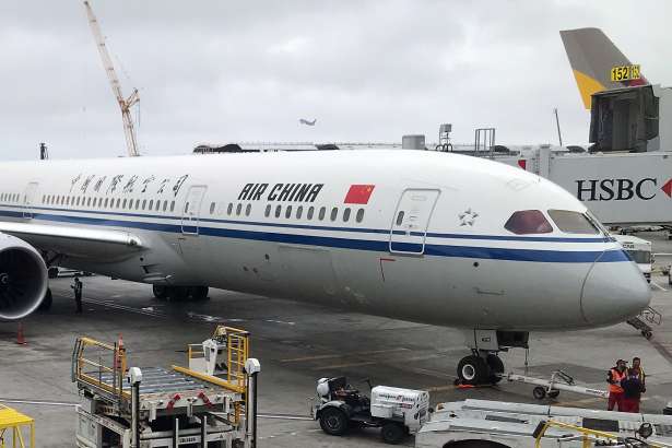 (FILES) In this file photo taken on May 24, 2018 an Air China airplane sits at a gate at Los Angeles International Airport. - The US modified a ban on Chinese commercial airlines on June 5, 2020, to allow two round-trip flights per week, matching the level permitted by Beijing and de-escalating somewhat a conflict between the countries. (Photo by Daniel SLIM / AFP) (Photo by DANIEL SLIM/AFP via Getty Images)
