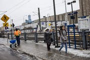 A crew arrived to de-ice the sidewalk at the 38th St. Station on the Blue line in south Minneapolis in February.