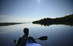 Paddling in the bow of a canoe while on Gunflint Lake during a BWCA trip last July.