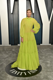 Maria Sharapova brightened up the Vanity Fair Oscar party with her neon-green Valentino gown.