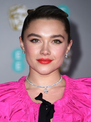 Florence Pugh's red lipstick provided a gorgeous contrast to her hot-pink outfit.