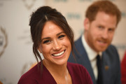 Meghan Markle looked retro-chic with her beehive while attending a roundtable discussion on gender equality.
