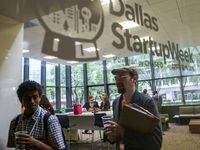 Participants work in a lounge area during Dallas Startup Week activities on Tuesday, April 12, 2016 at 1700 Pacific Avenue in Dallas.