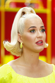 Katy Perry went majorly retro with this flipped ponytail at the Fight On concert.