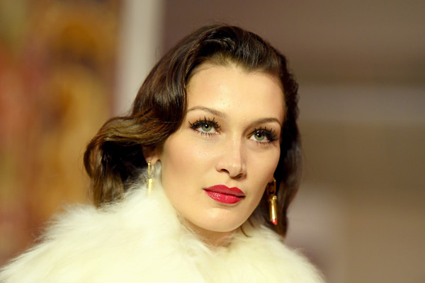 Bella Hadid amped up the allure with a swipe of red lipstick.