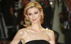 Actress Elizabeth Debicki poses for photographers upon arrival at the premiere of the film 'The Burnt Orange Heresy' at the 76th edition of the Venice