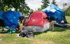 Police cleared a sprawling homeless encampment at Minneapolis' Powderhorn Park.