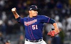 Minnesota Twins pitcher Brusdar Graterol throws against the New York Yankees during the eighth inning in Game 1 of the American League Division Series