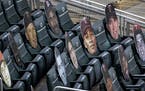 Face cutouts were placed behind home plate at Target Field for the Minnesota Twins home opener. ] CARLOS GONZALEZ • cgonzalez@startribune.com – Mi