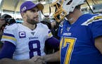 Minnesota Vikings quarterback Kirk Cousins spoke with Los Angeles Chargers quarterback Philip Rivers at the end of the game.